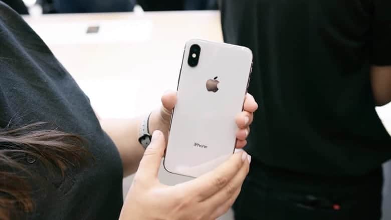 iphone X in hand